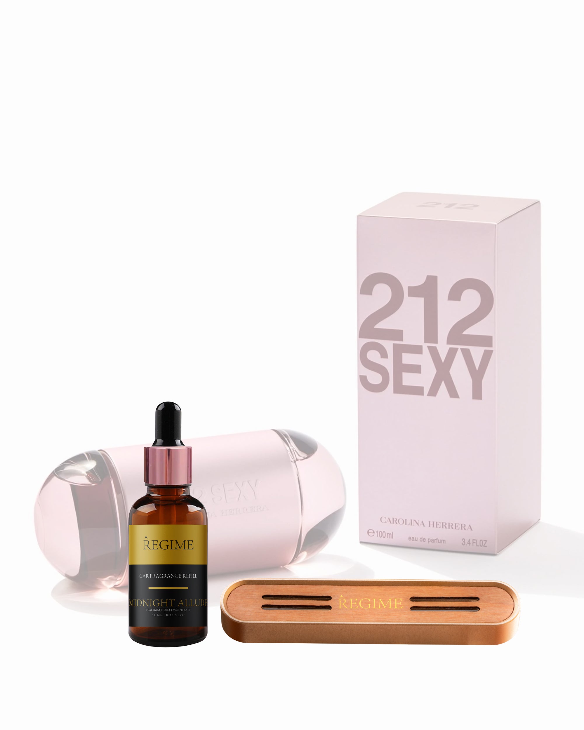 A hazy background featuring 212 Sexy perfume for women; at the forefront, a fragrance oil dropper bottle inspired by 212 Sexy and a Regime Fragrances car air freshener vent clip with a rose gold metal casing and a wooden front panel featuring ventilation grooves for scent spread out.
